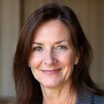 Portrait of Elara Vance, a calm and wise mentor, smiling gently.