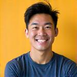 Portrait of Kai Lun, an energetic and enthusiastic mentor, with a thoughtful expression.